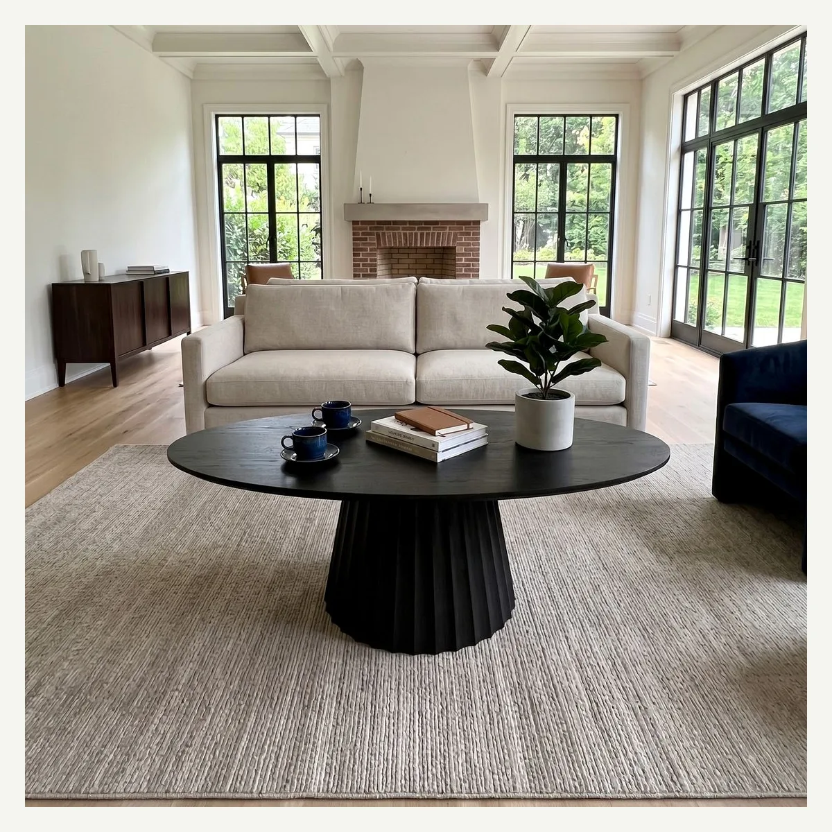 Black Oval Pedestal Coffee Table — alternate setting