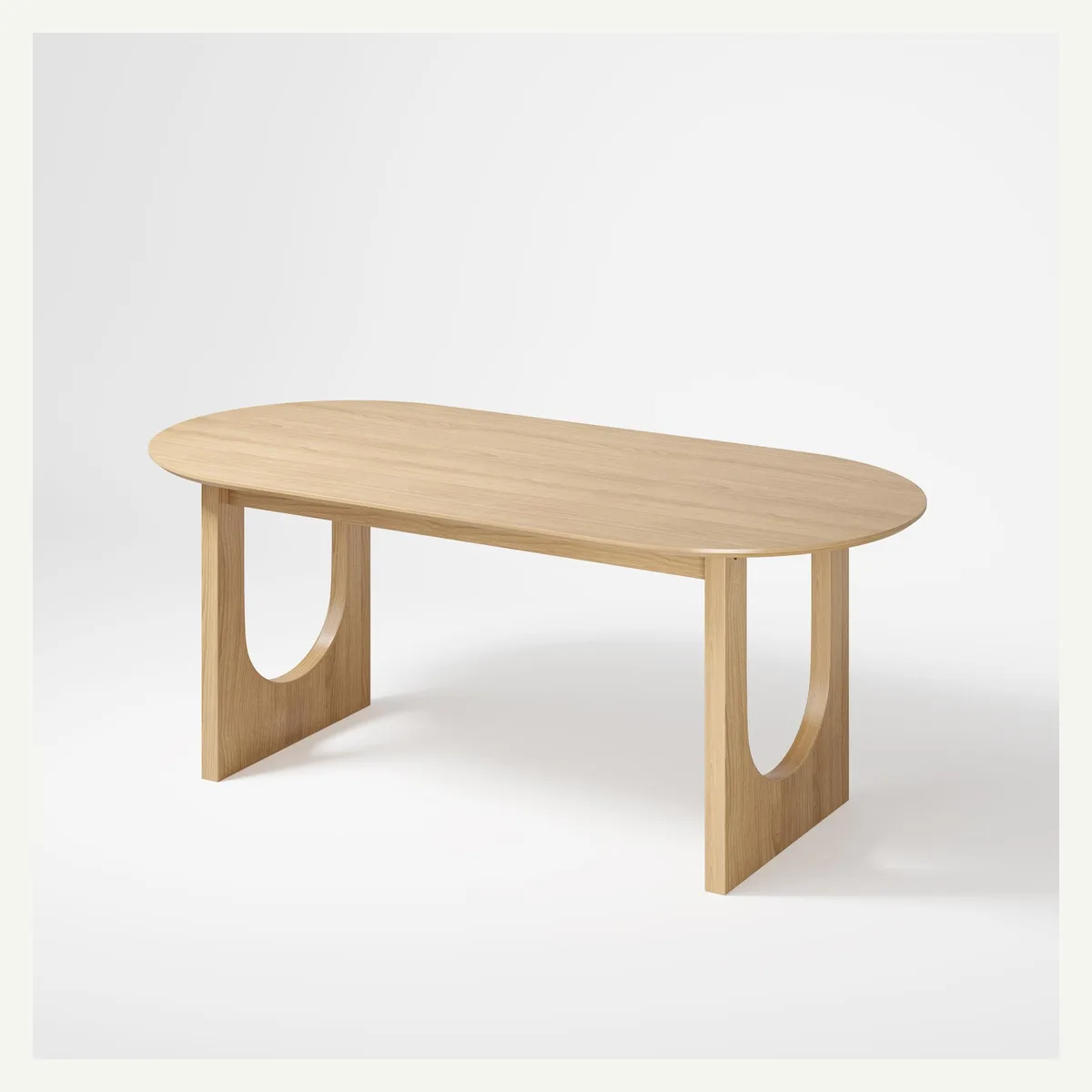 Oval Arch-Cutout Dining Table — light finish