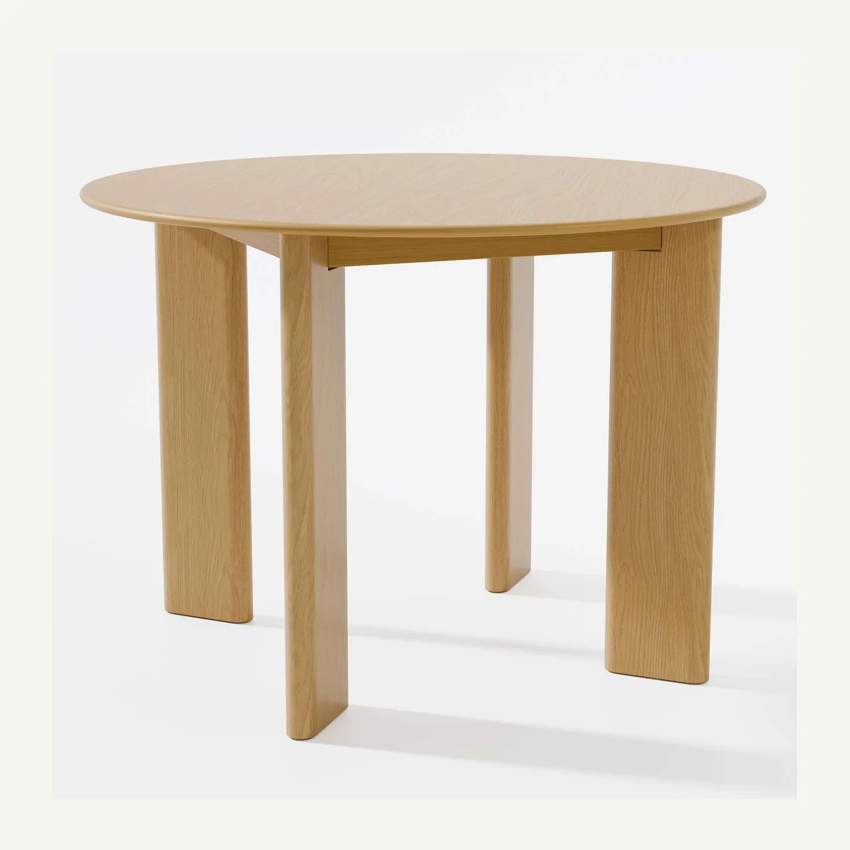 Round Inset-Leg Dining Table — light finish