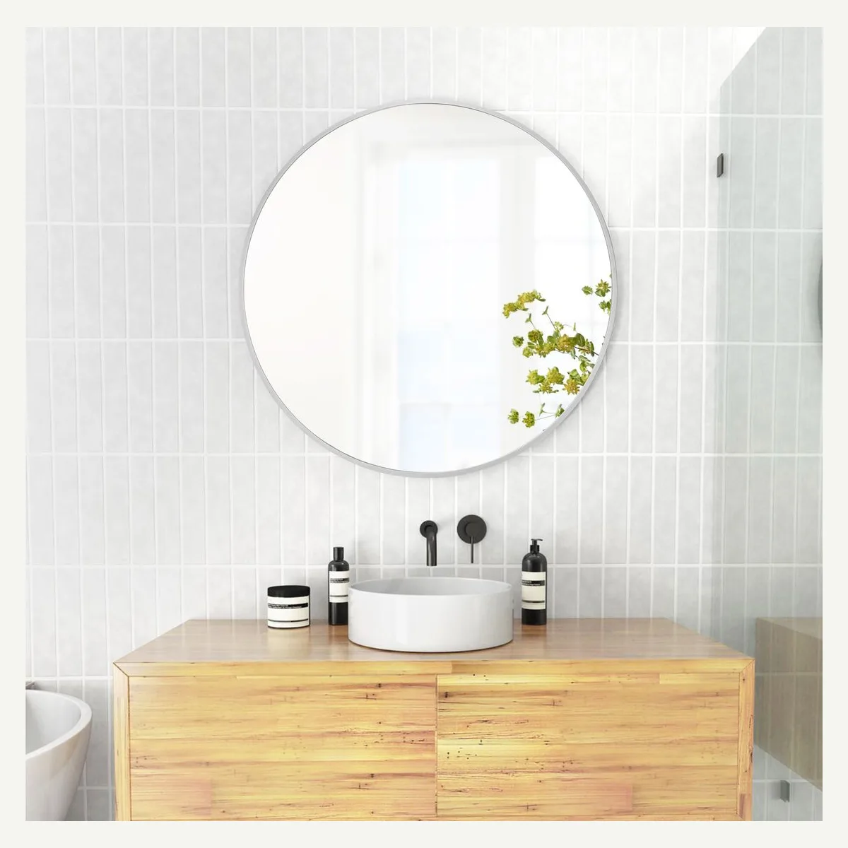 Silver-Tone Round Wall Mirror — bathroom setting